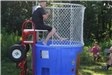 A police officer over a dunk tank