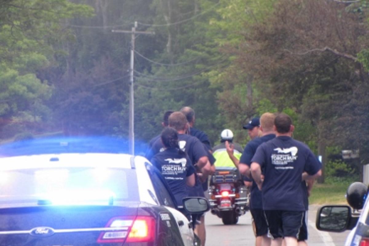 Officers running with police escort 7