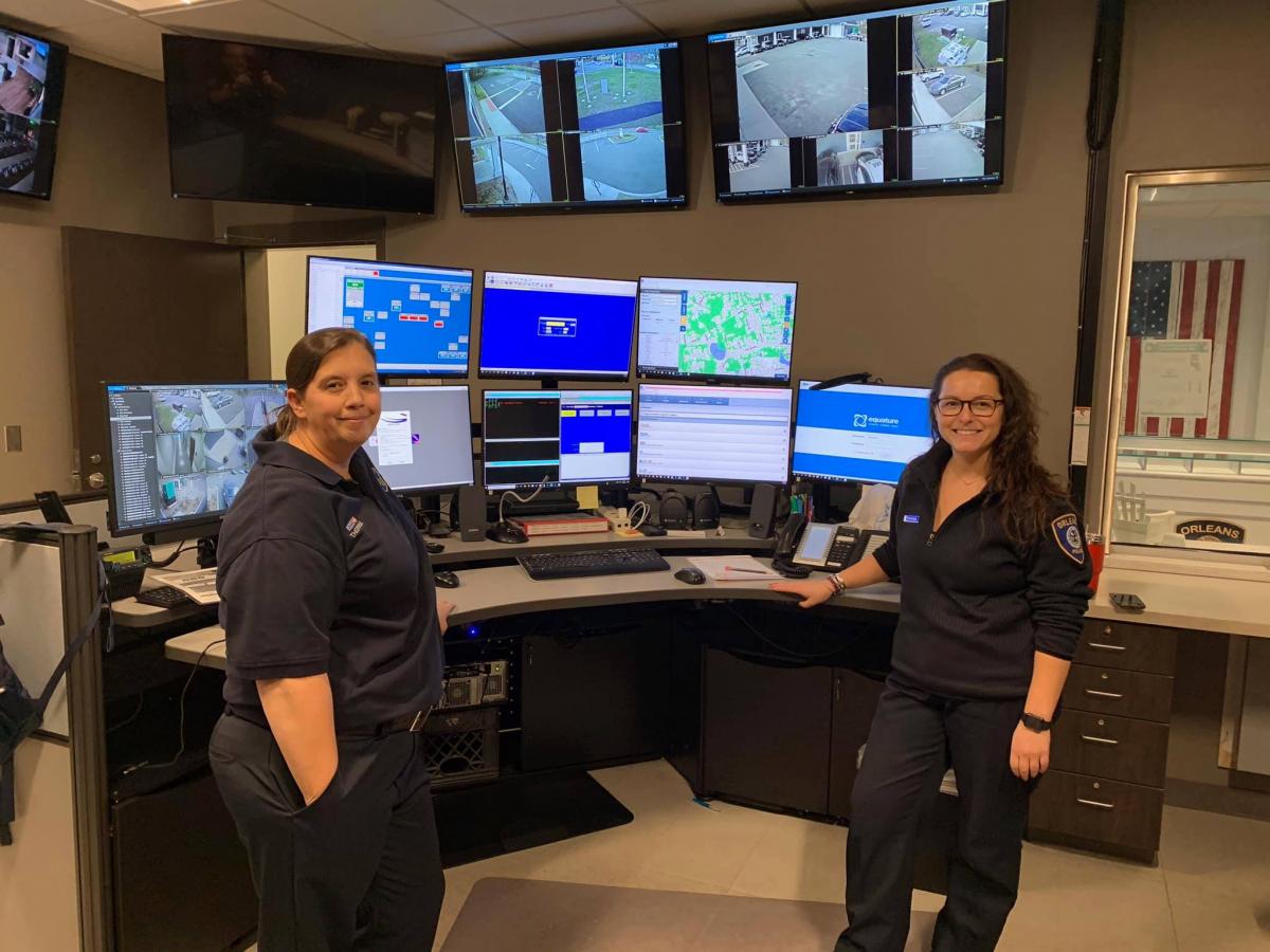 Two employees in the dispatch center
