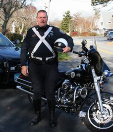 A police officer with the motorcycle
